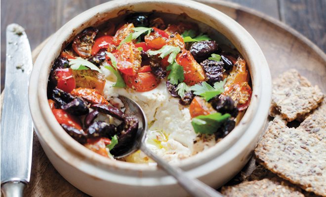Baked feta with olives, peppers and tomatoes