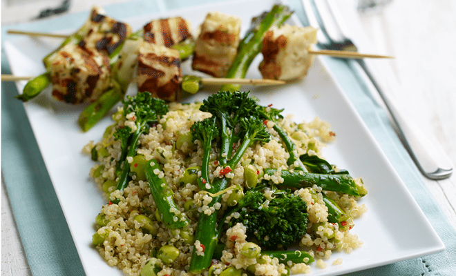 Quinoa salad with Tenderstem, soy beans and chilli dressing served with BBQ halloumi and spring onion kebabs